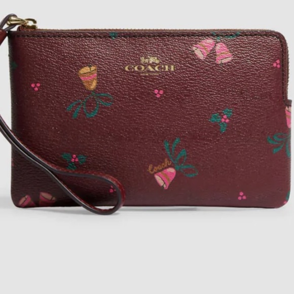 Coach Handbags - Coach Corner Zip Wristlet With Holiday Bells Print